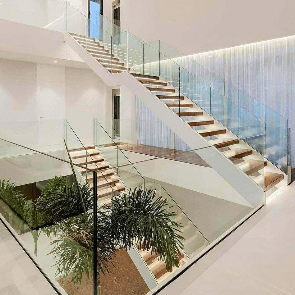 escada com corrimão de vidro